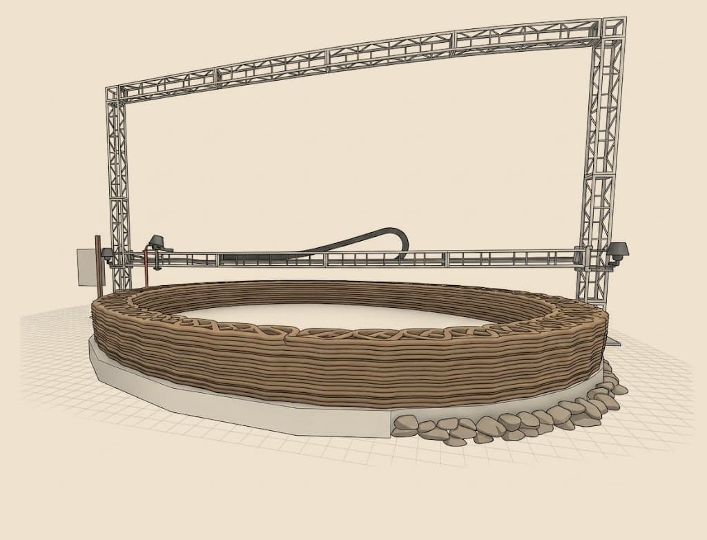 Impresora Barrobot: pórtico de truss con un puente horizontal que sostiene la boquilla, imprimiendo un muro circular de barro sobre una platea de hormigón con zócalo de piedra